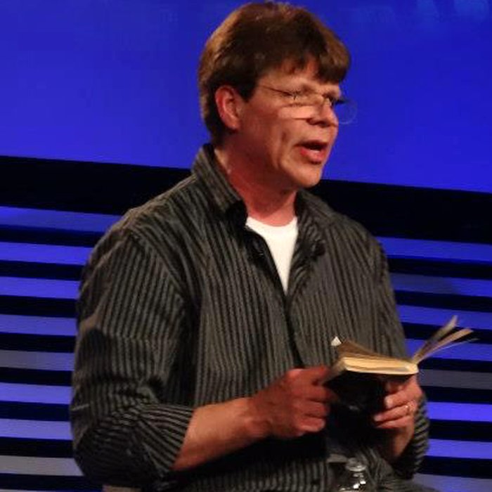 Rob Fore speaking on stage